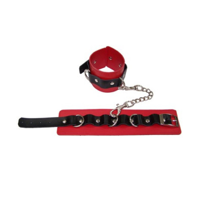 Red leather wrist restrains with chain
